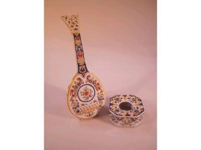 A Mosanic faience pottery tulip or spill vase modelled as a mandolin