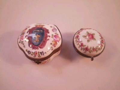 A 19thC French porcelain trinket box with metal mount and shell front piece