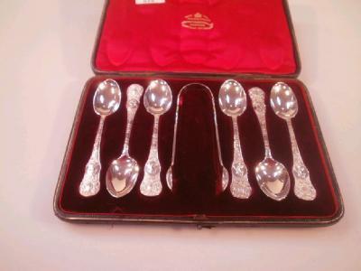 A set of six Victorian silver teaspoons and a pair of matching sugar tongs