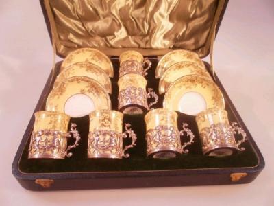 An Edward VII silver and bone china coffee service by Walker & Hall