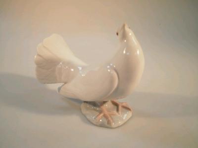 A Lladro figure of a dove