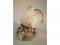 A Royal Crown Derby porcelain figure of a pigeon with matte glaze on a