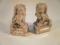 A pair of 20thC carved jade Buddhistic lions