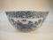 A large Chinese blue and white bowl decorated with panels of