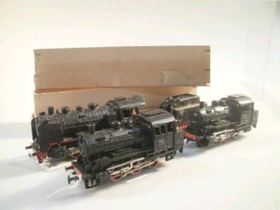 A boxed Marklin steam engine 00 gauge 0-6-0 with tender in black livery
