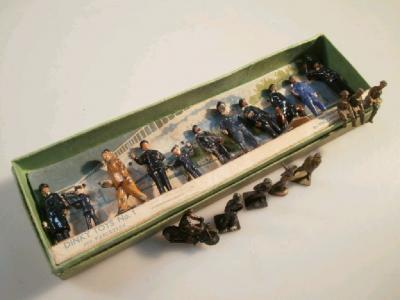 A Dinky Toys boxed railway set of figures and other military figures including signal man