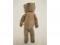 An early 20thC articulated bear with button eyes