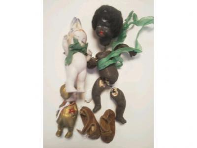 A late 19thC German pottery Christmas decoration in the shape of a young girl
