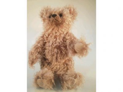 A modern Steiff grizzly ted caramel tipped growling bear