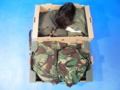 A military camouflage jacket and trousers