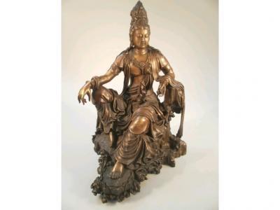 A modern cast metal figure of Buddha