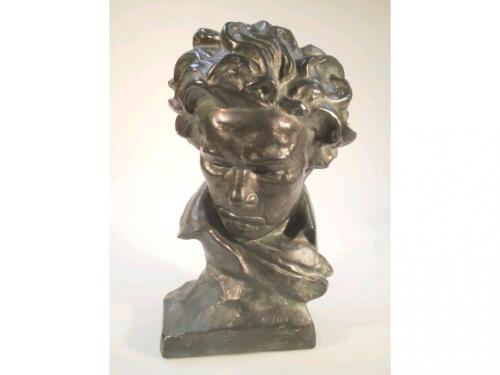 A cast plaster of paris bust of a 19thC gentleman