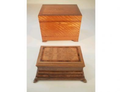 Two inlaid work boxes on bracket feet