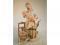 A Capo-di-Monte figure of a woman holding her baby a/f