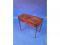 A George III mahogany card table with cross banded top above a satin wood