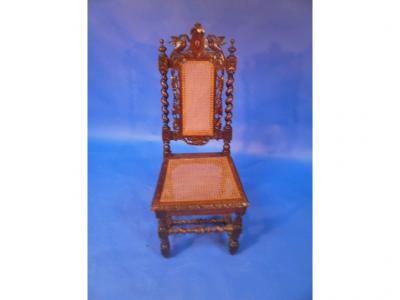 A Victorian oak barley twist hall chair with cane back in the