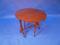 A mid Victorian walnut Sutherland table