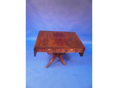 A 19thC sofa table, the top inlaid with satin wood with two drawers below,