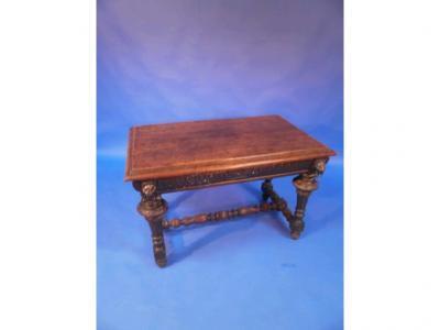 A late Victorian Renaissance Revival oak side table