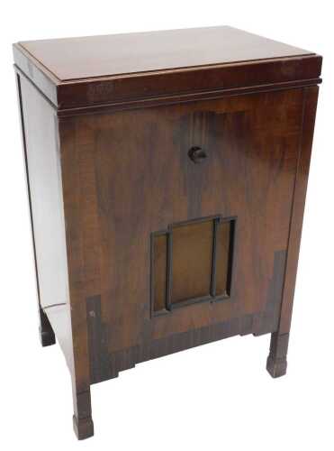 A mid 20thC HMV radiogram, with Bakelite arm, baize turntable, in freestanding cabinet, 86cm...