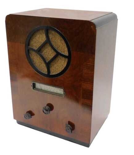 A mid 20thC walnut Defiant model number M234 10-100 cased radio, 48cm high. WARNING! This lot...