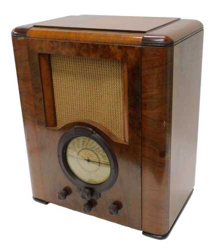 A mid 20thC walnut cased Pilot U535 vintage valve radio, number 99383, 49cm high. WARNING! This...