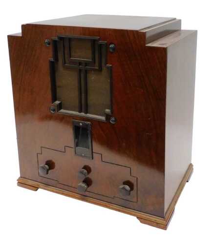 A mid 20thC walnut Art Deco radio, circa 1930, possibly Cossor, 48cm high. WARNING! This lot...