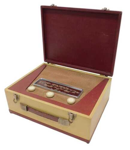 A mid 20thC Pilot BM90 AC/DC mains portable radio, circa 1955, 13cm high. WARNING! This lot...