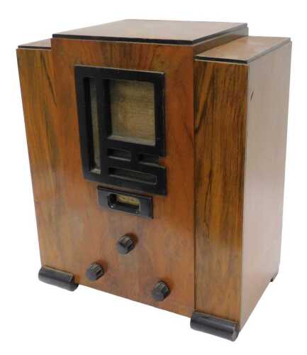 A mid 20thC Art Deco cased radio, 46cm high. WARNING! This lot contains untested or unsafe...