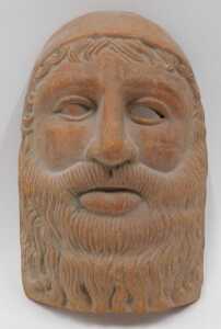 An Antiksan Turkiye Hermes bust, Roman style face mask, and a further bust of Apollo. (3) - 2