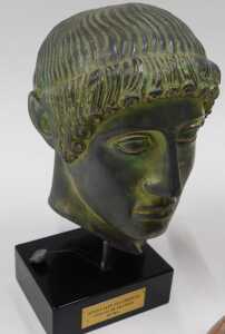 An Antiksan Turkiye Hermes bust, Roman style face mask, and a further bust of Apollo. (3) - 3