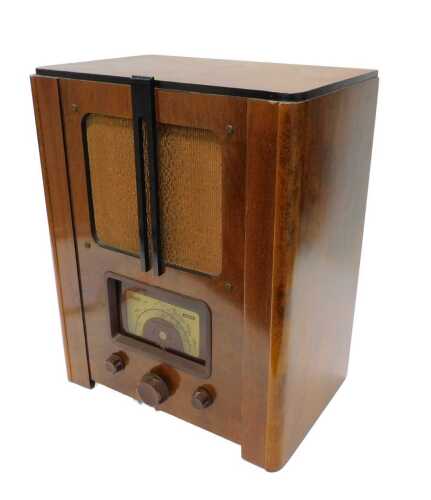 A mid 20thC walnut cased KB type 590 Kolster-Brandes radio, 49cm high. WARNING! This lot...