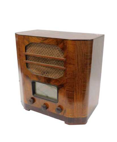 A mid 20thC walnut cased Ultra Electric Limited valve radio, circa 1935, 45cm high. WARNING!...