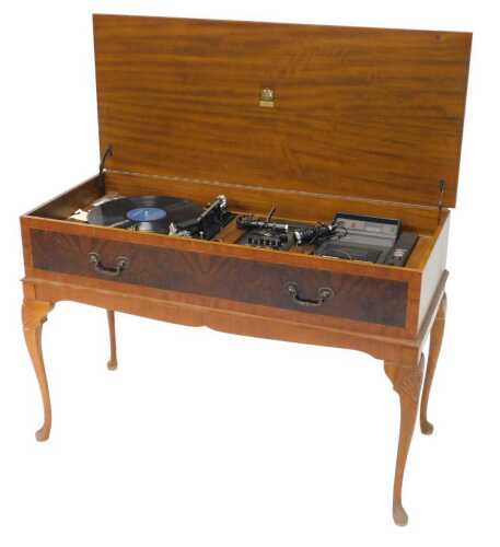 A Dynatron radiogram, with Garrard 35SB turntable, and Dolby cassette recorder, in a...