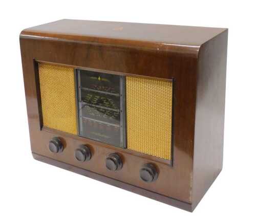 A mid 20thC walnut cased Bush AC11 radio, 38cm high. WARNING! This lot contains untested or...