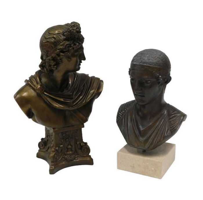 A bronze finished bust of Apollo, on inverted classical socle, 32cm high, and a further...