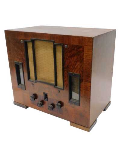 A mid 20thC walnut cased Marconi model 298 radio, circa 1940, 41cm high. WARNING! This lot...