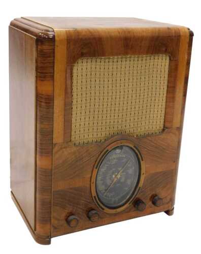 A mid 20thC walnut cased Ferguson 503AC tombstone style radio, 55cm high. WARNING! This lot...