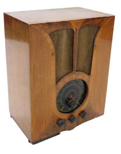 A mid 20thC walnut cased Philco radio, tombstone style, circa 1930s, 49cm high. WARNING! This...