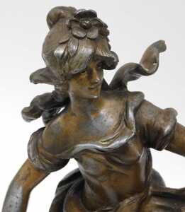 A pair of early 20thC Moreau spelter figures of dancing ladies, semi-clad on naturalistic bases,... - 2