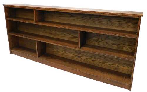 A late 20thC oak open bookcase, of rectangular form, set with fixed shelves with dividers, 94cm...