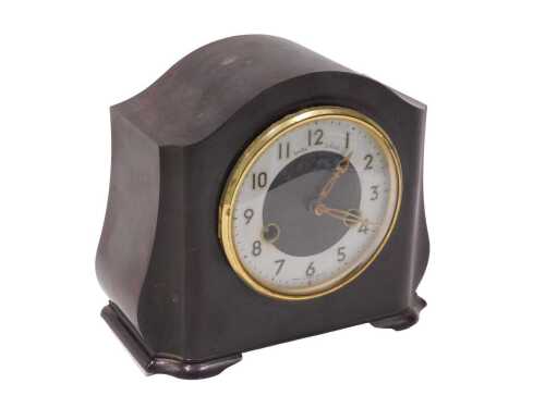 A 20thC Bakelite cased Smiths Enfield mantel clock, with 11cm diameter Arabic dial and eight day...