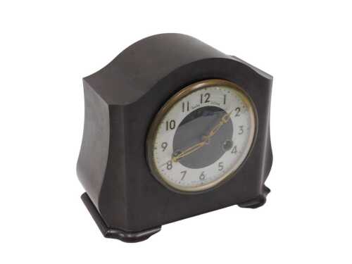 A 20thC Bakelite cased Smiths Enfield mantel clock, with 11cm diameter Arabic dial and eight day...