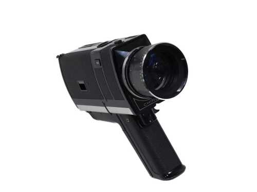 A Chinon 672 Auto Zoom Classic Super 8 movie camera, in outer case, 20cm high.