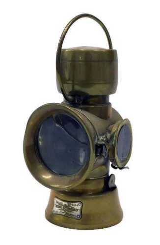 A 20thC King's Road Lucas brass back light or carriage lantern, with circular glazed front and...
