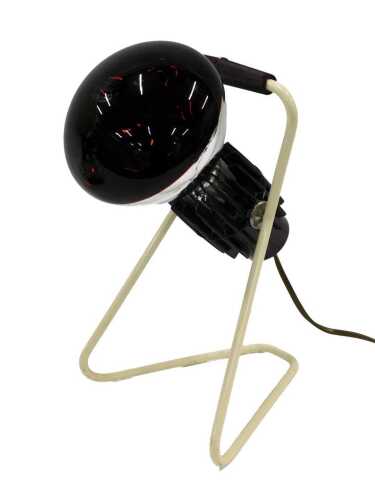 A portable heat lamp with red glass bulb, 36cm high.
