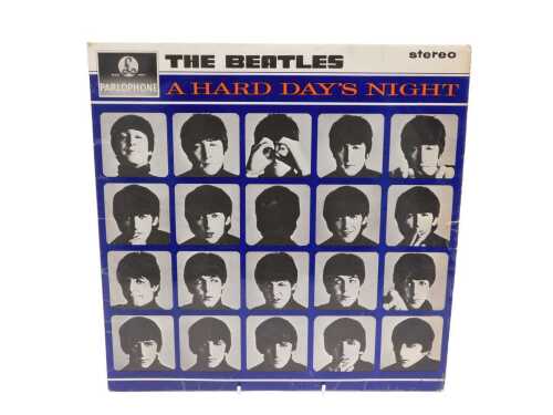 The Beatles A Hard Days Night record Parlophone stereo, 33 1/3 record, in sleeve, 32cm high.