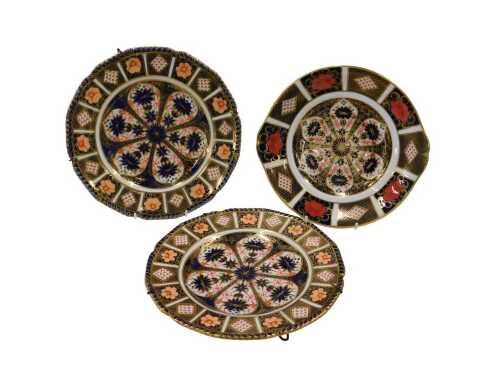 A Royal Crown Derby Imari 1128 plate, 26cm wide, and a pair of earlier Derby Imari plates. (3)