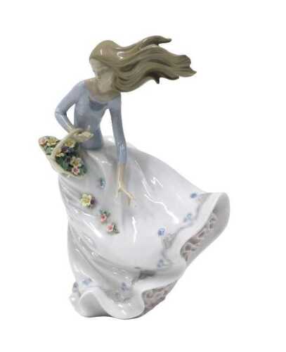 A Lladro figure group Petals on the Wind, 28cm high. (boxed)