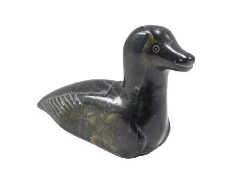 An Eskimo Art carved soapstone duck, labelled beneath, 12cm high.